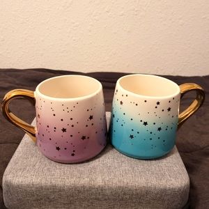 Pair of gold handle/stars coffee cups